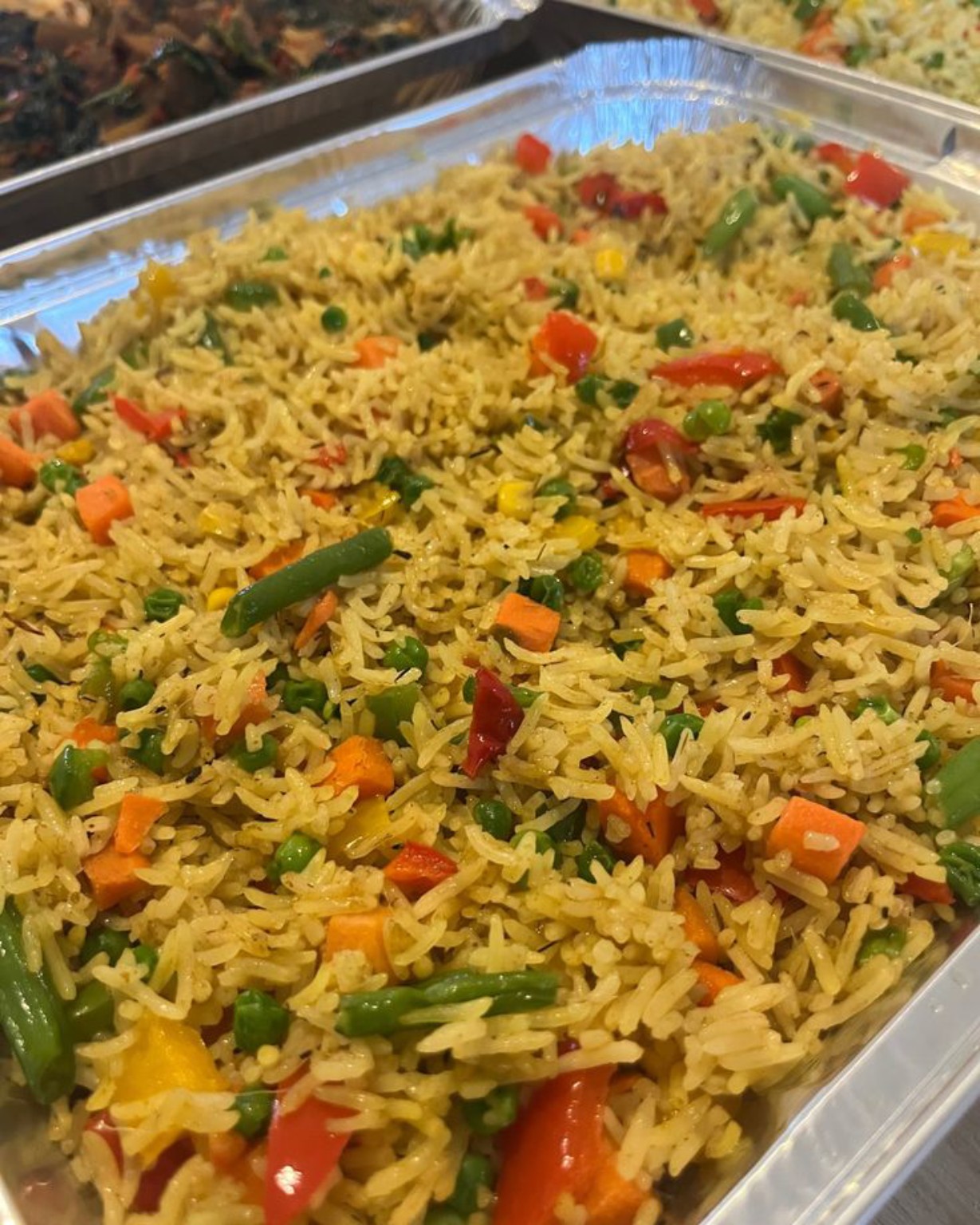 Colorful vegetable fried rice prepared by JC Treats & Food